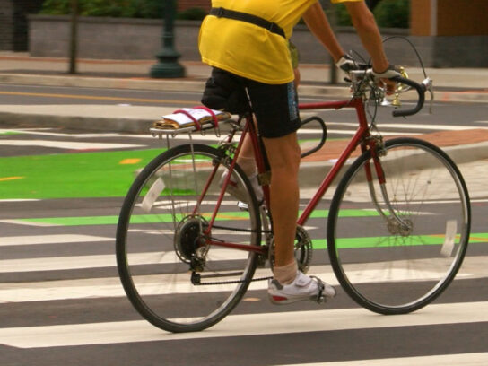 photo of bike rider on bike to work day