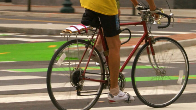 photo of bike rider on bike to work day
