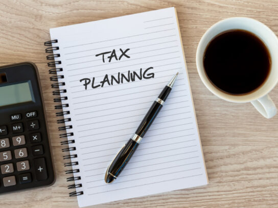tax planning text on note pad picture