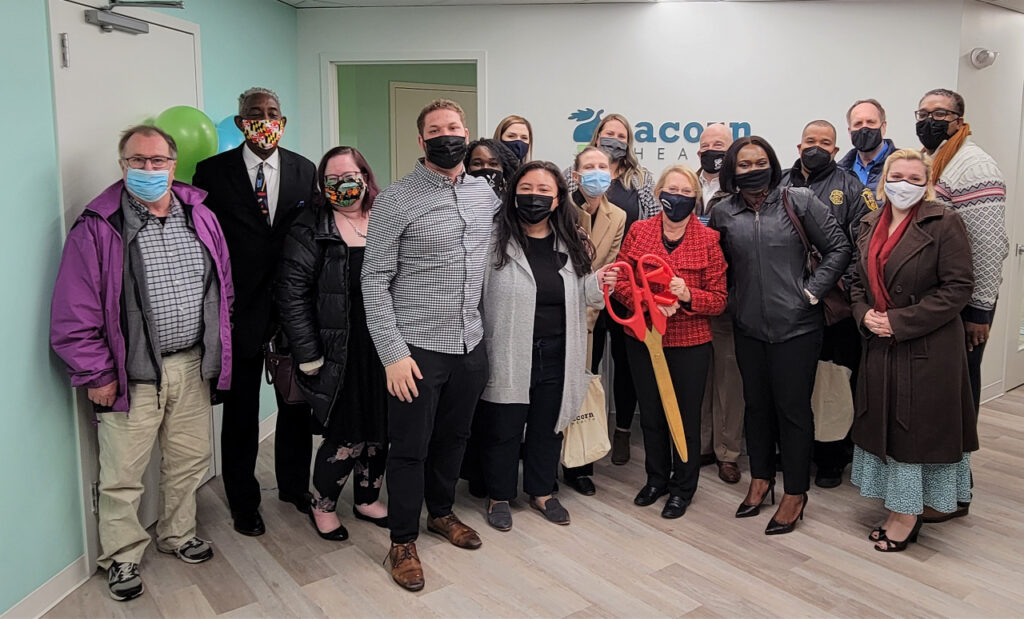 photo of Acorn Health staff at ribbon cutting