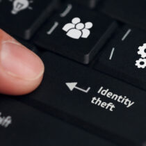 photo of keyboard with Identity Theft key