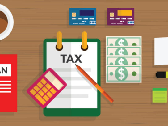 graphic showing desk with tax planning tools
