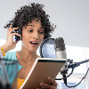 photo of young black woman podcast reading her script