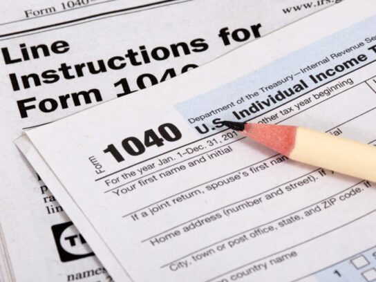 photo of IRS Form 1040 with a pencil