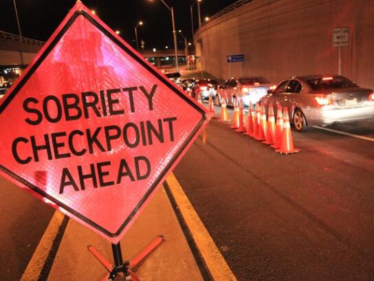 photo of sobriety checkpoint ahead sign
