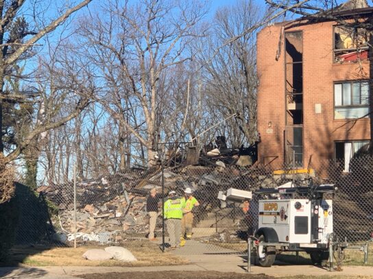 photo of SS apartment explosion day after march 4 10 fencing is up