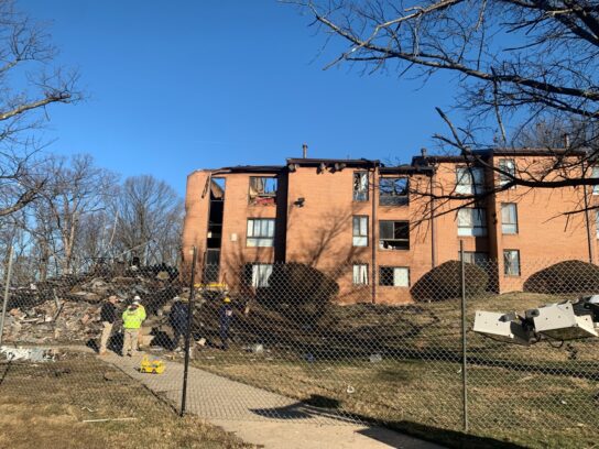 SS apartment explosion day after march 4 11 child's toy behind fencing