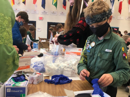 photo of Ukrainian-Girl-and-Boy-Scouts-Make-Emergency-Medical-Kits-in-Bethesda-to-Ship-Overseas-westland-middle-school