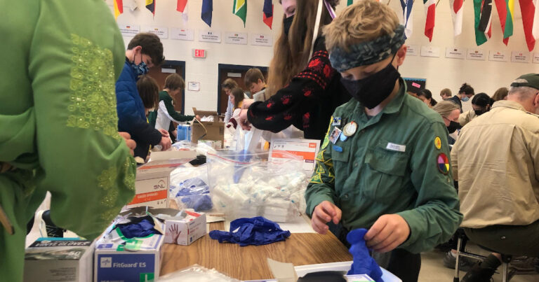 photo of Ukrainian-Girl-and-Boy-Scouts-Make-Emergency-Medical-Kits-in-Bethesda-to-Ship-Overseas-westland-middle-school