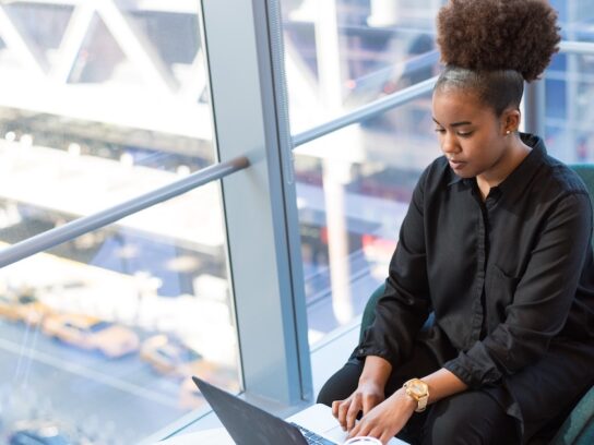 photo of woman with laptop