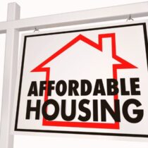 photo of realtor type sign with words affordable housing