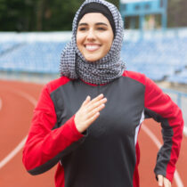 photo of muslim woman with hajib running tract