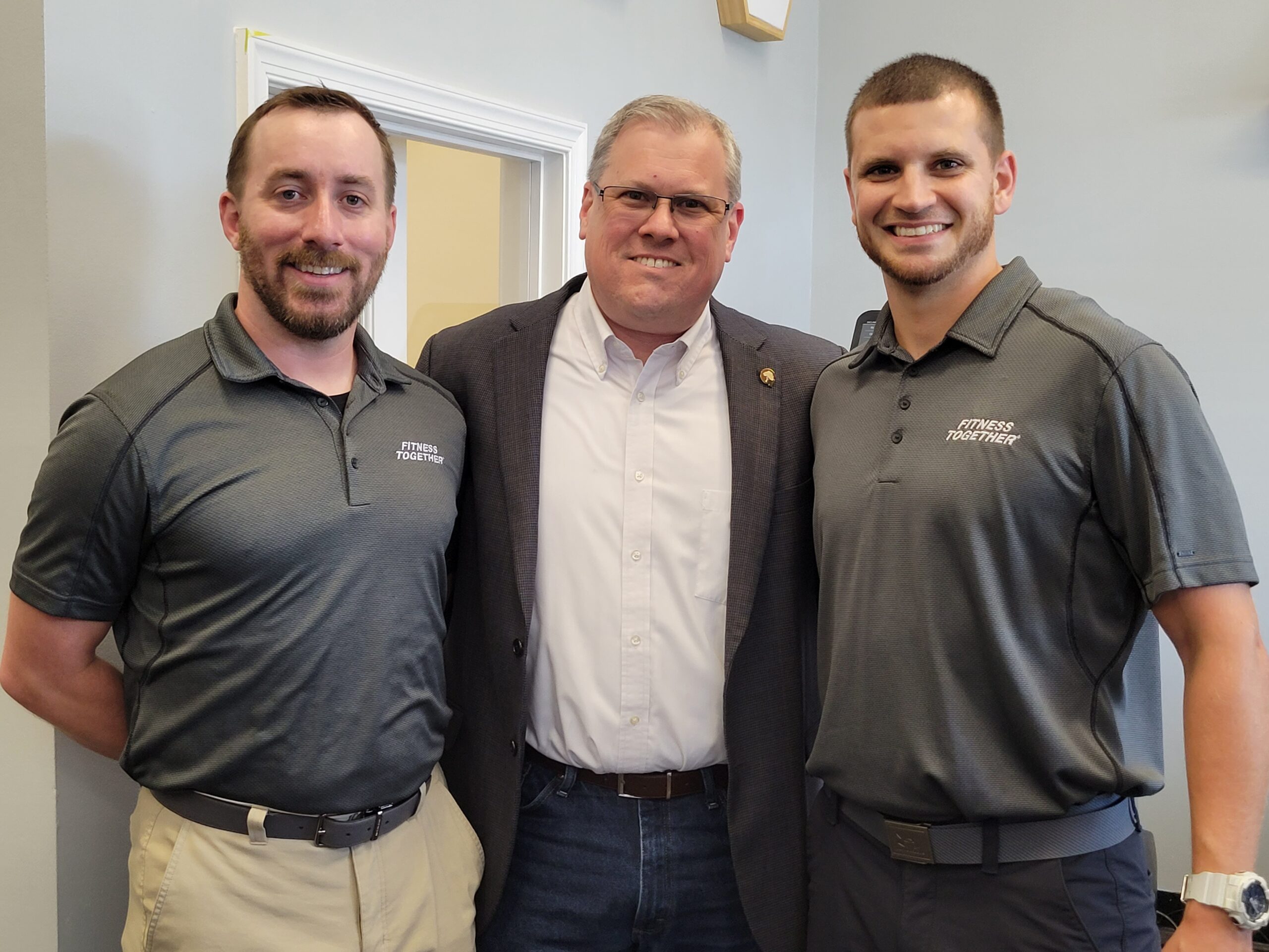 photo of Fitness Together's Chris LaVeck, Gaithersburg Mayor Jud Ashman and Fitness Together's Clark Sharp