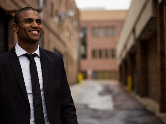 photo of man in suit outside