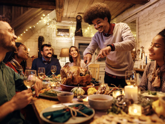 thanksgiving gathering over turkey dinner