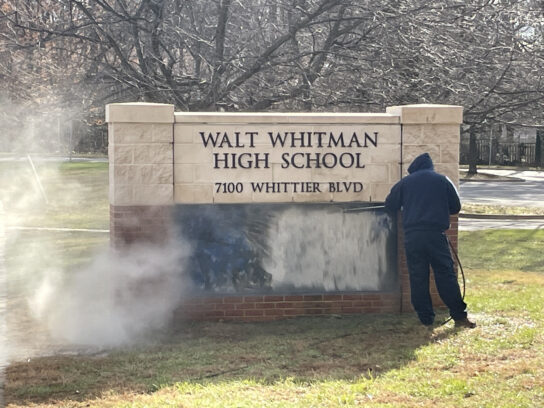 photo of Walt Whitman sign with antisemetic message