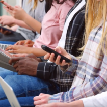 students on phones and mobile devices