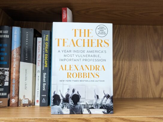 photo of the book The Teachers by Alexandra Robbins on a bookshelf