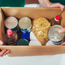 box of canned non-perishable food for donation istock