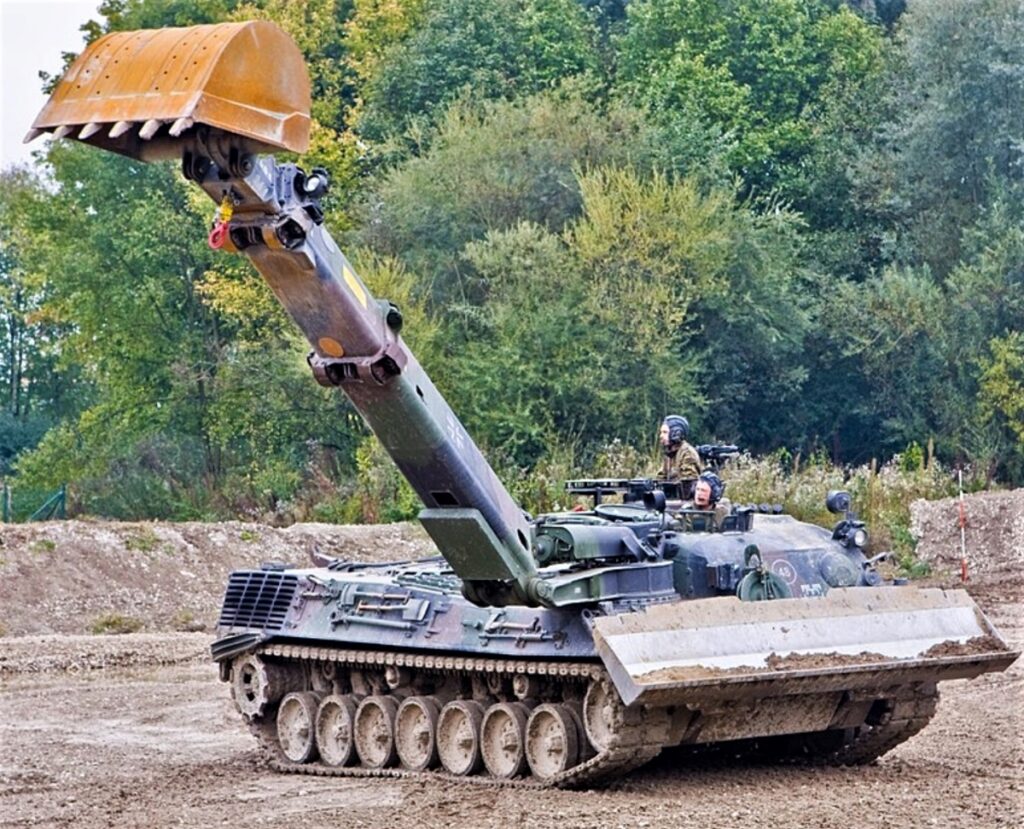 photo of a German AEV based on the Leopard 2 battle tank chassis can rapidly fill in an anti-tank ditch with its dozer blade and bucket. This excellent vehicle has apparently not been provided to the Ukrainians by the Germans.