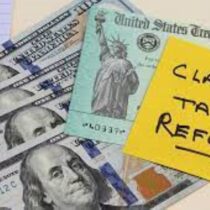 photo of dollars with sticky note "Claim Tax Refund"