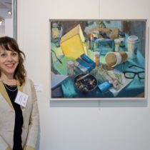 Artist Nicole Santiago at Bethesda Painting Awards with her winning painting