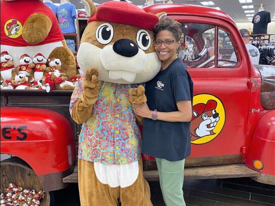 4. Buc-ee’s mascot, a buck-toothed beaver (after the “Beaver” founder) poses with a patron.