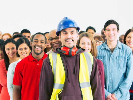 photo of construction worker and other workers